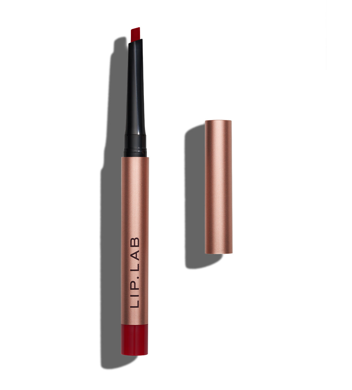 A Lip Lab Sketch & Shade Lip Liner in the shade Realist Red.